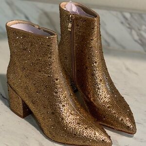 Gold rhinestone ankle boot.